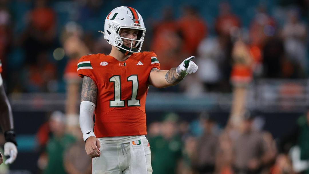 Sep 13, 2025; Miami Gardens, Florida, USA; Miami Hurricanes quarterback Carson Beck (11) reacts on the field against the South Florida Bulls during the fourth quarter at Hard Rock Stadium. Mandatory Credit: Sam Navarro-Imagn Images